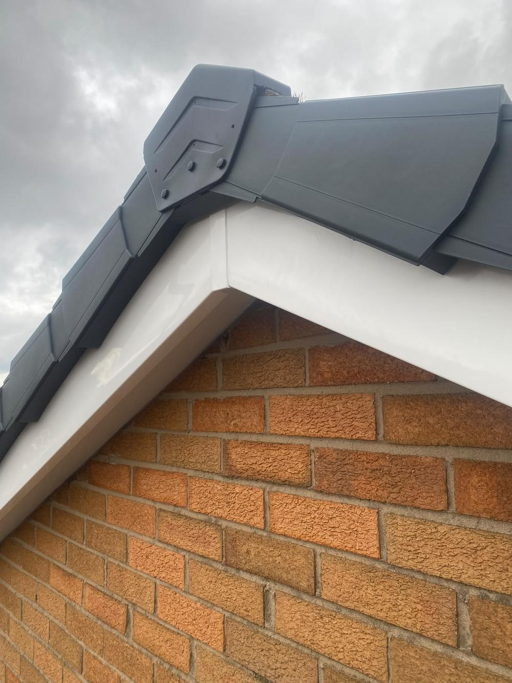 The same gable apex finished with a dry verge ridge cap